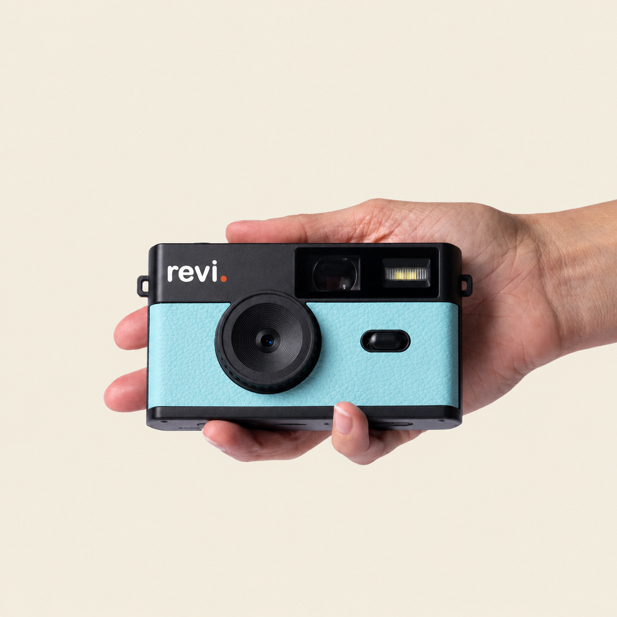 Appareil REVI bleu tenu dans une main